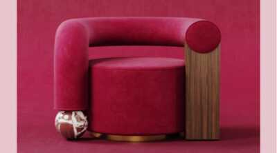 Viva Magenta, la couleur Pantone 2023 sur une fauteuil de la marque Malabar